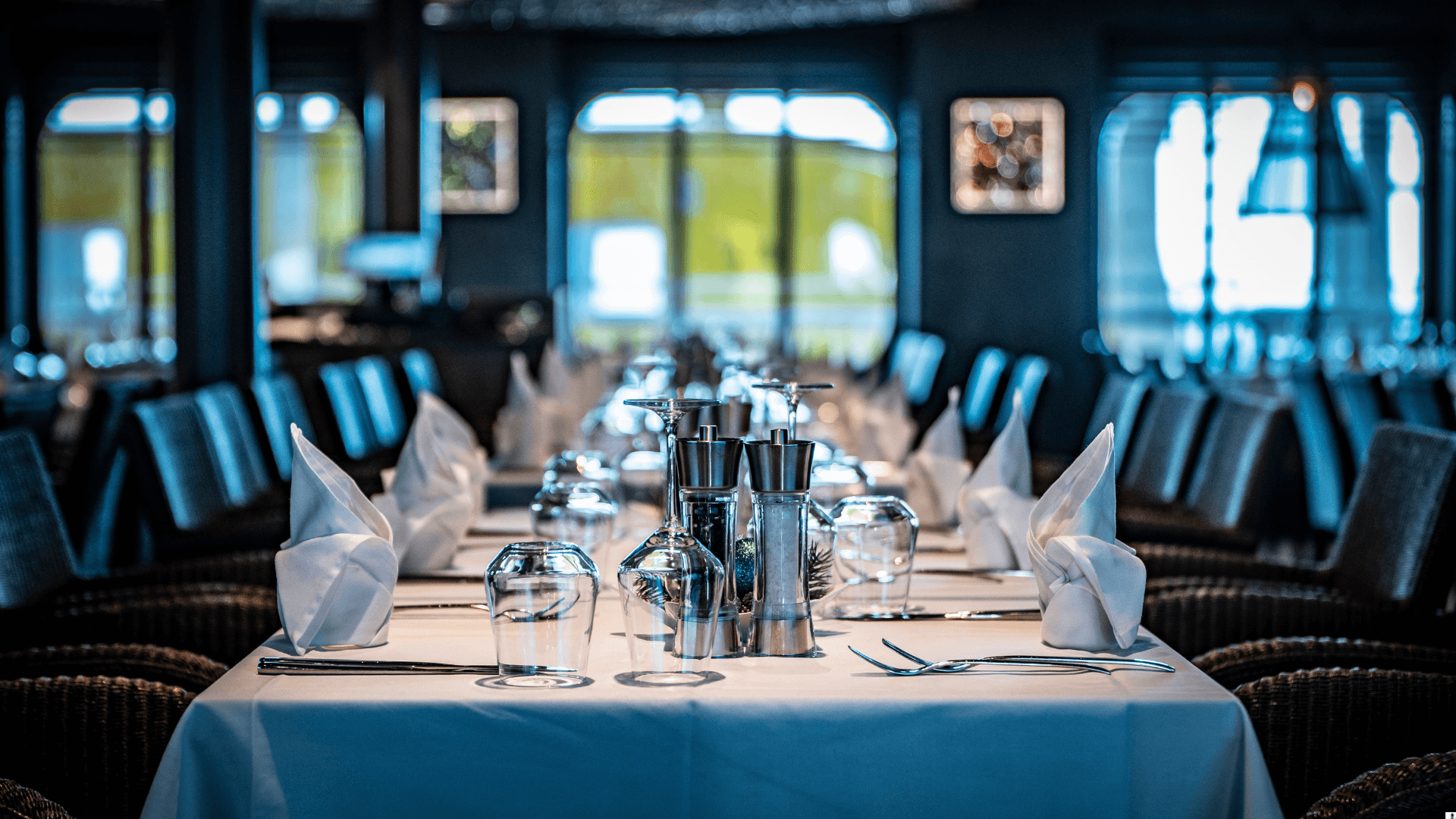 Elegant navy dinner table with candelabras