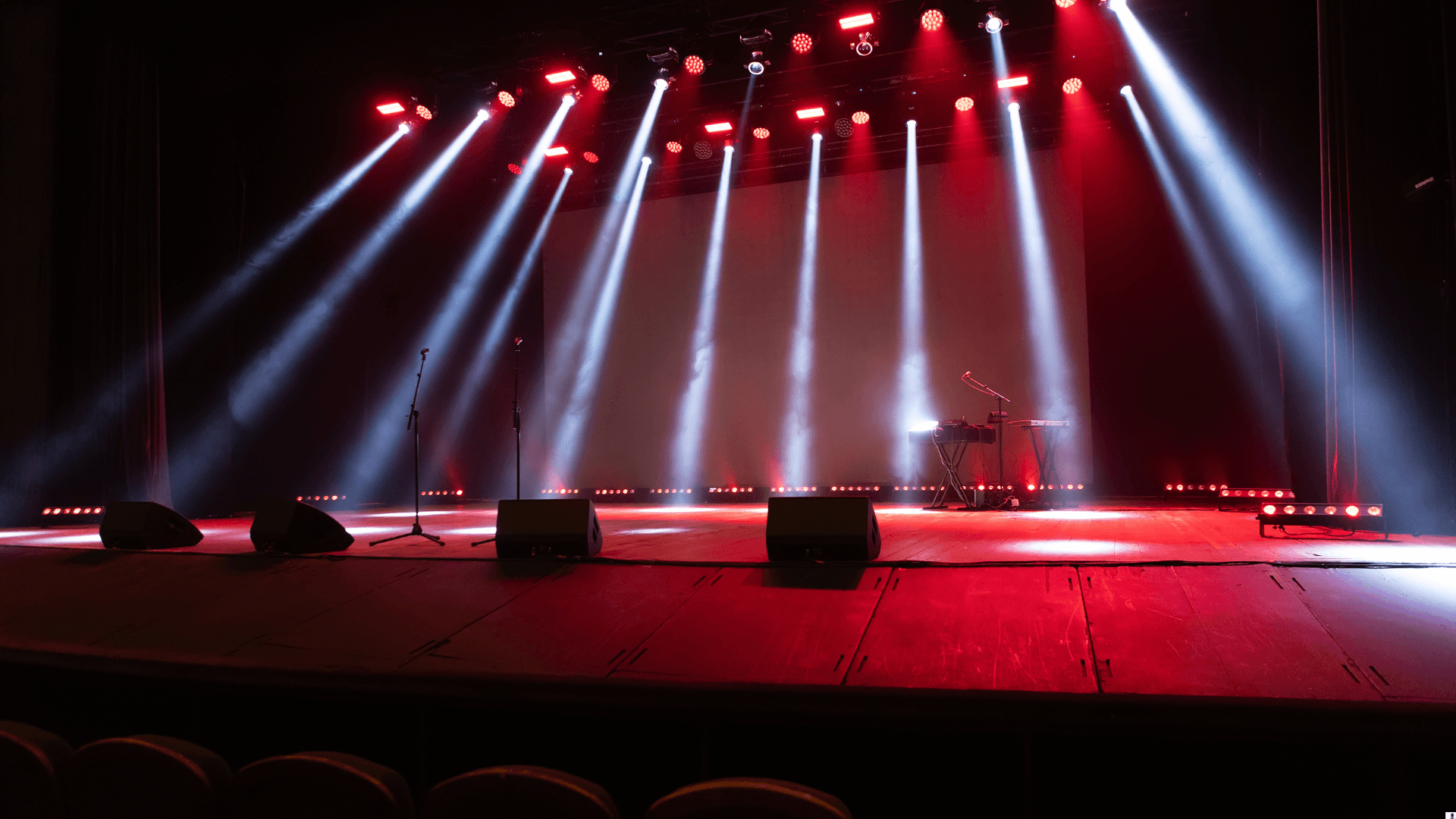 Stage with dramatic beam lighting