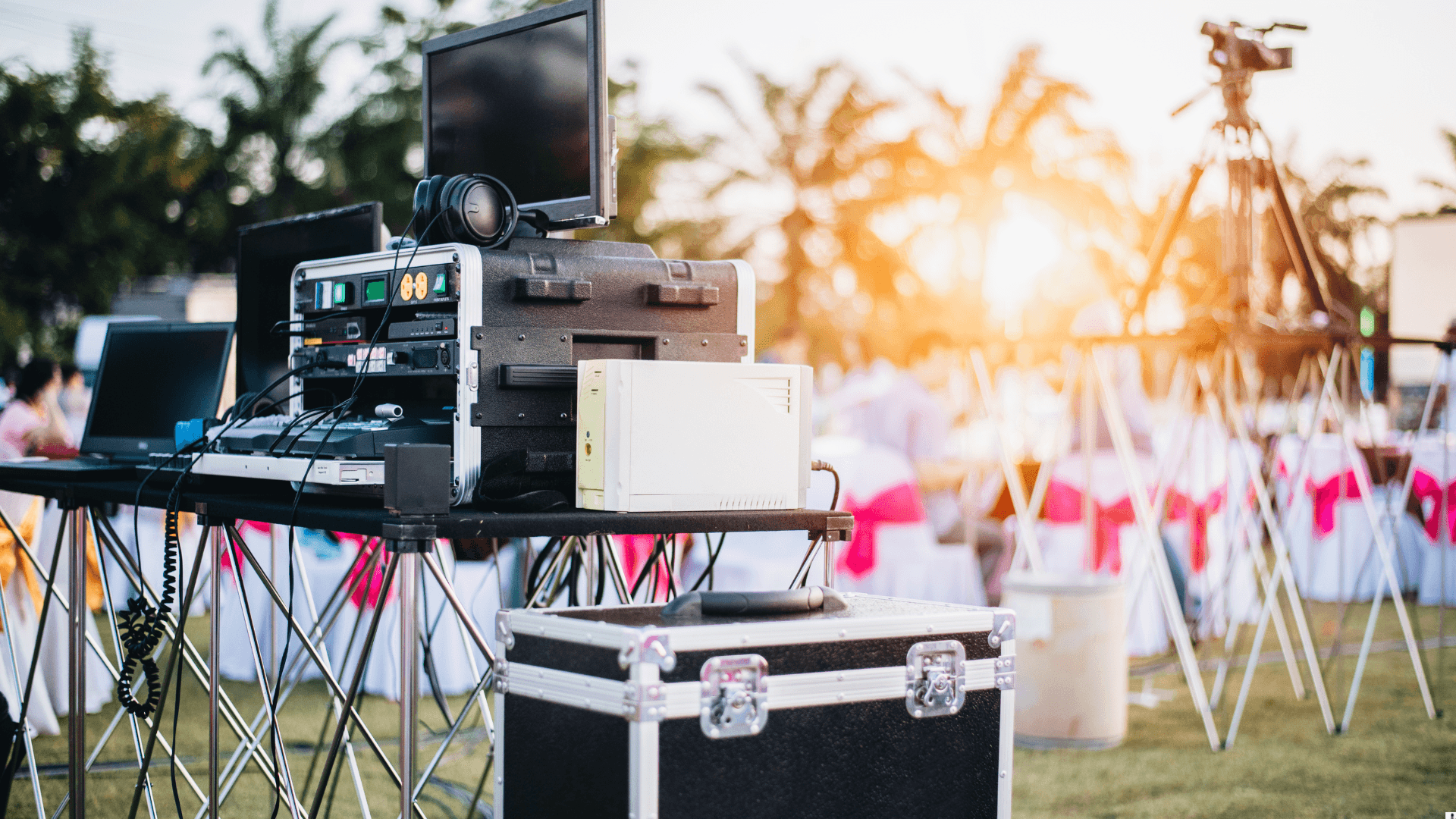 Outdoor AV equipment setup at sunset